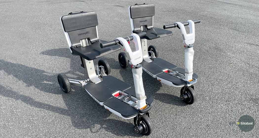 Two foldable mobility scooters