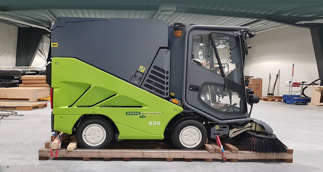Compact street sweeper side view